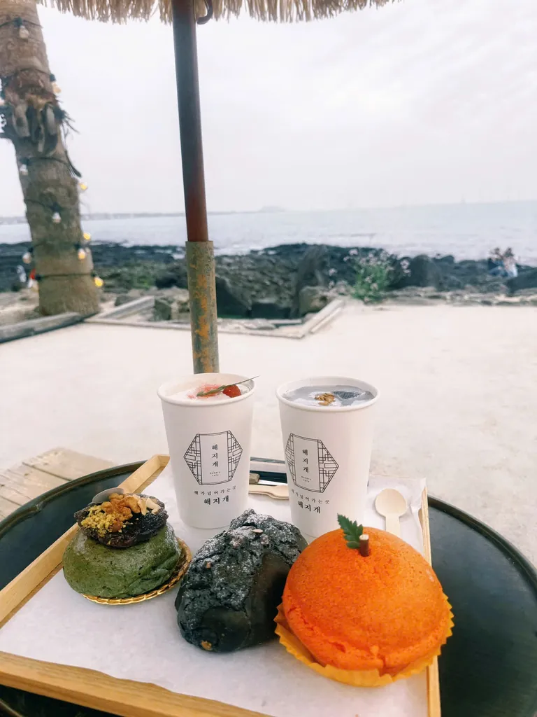 Tangerine-shaped pastries by the sea.