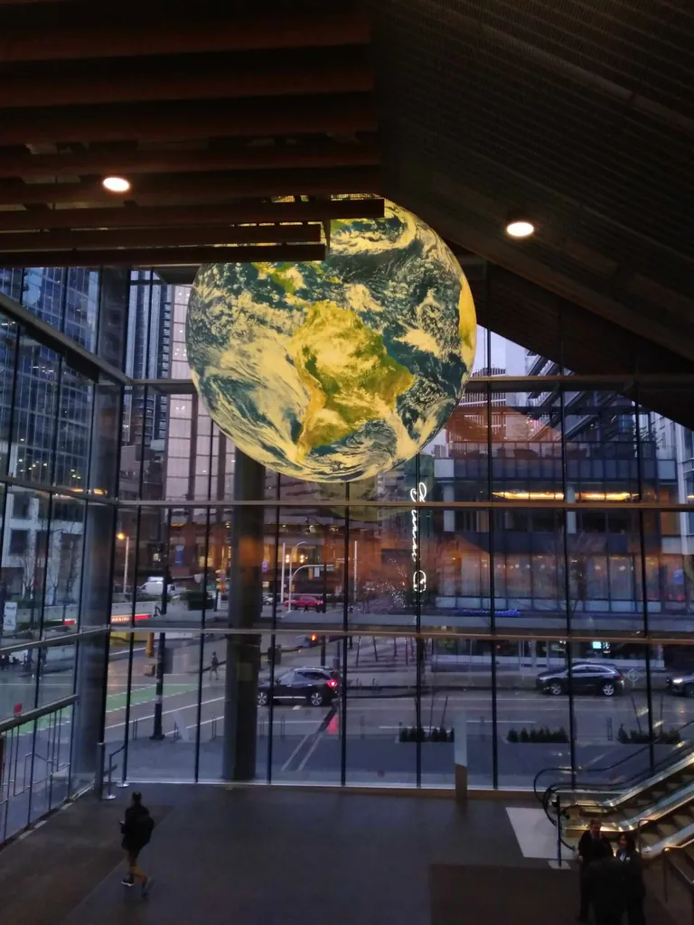 A globe suspended above the street.