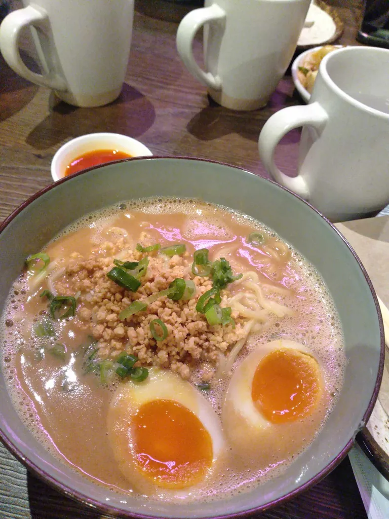 Ramen with two soft eggs.