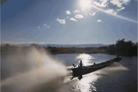 Generated animation of a boat crossing a river