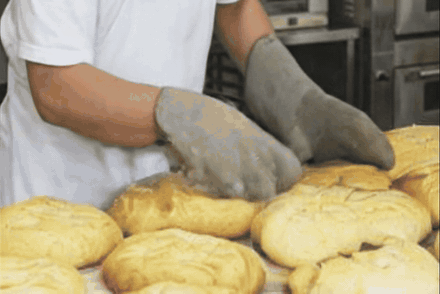 Generated animation of a baker shaping dough